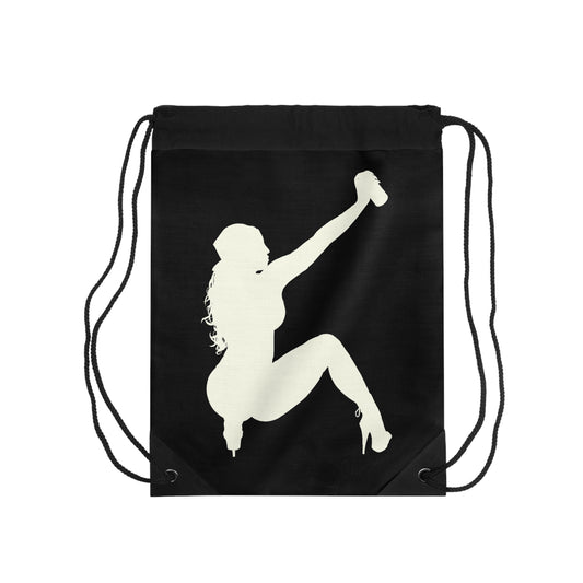 A black drawstring backpack featuring a large cream-colored silhouette graphic of a woman in a crouched pose holding a spray can, shown against a plain white background. Graffiti City logo. 
