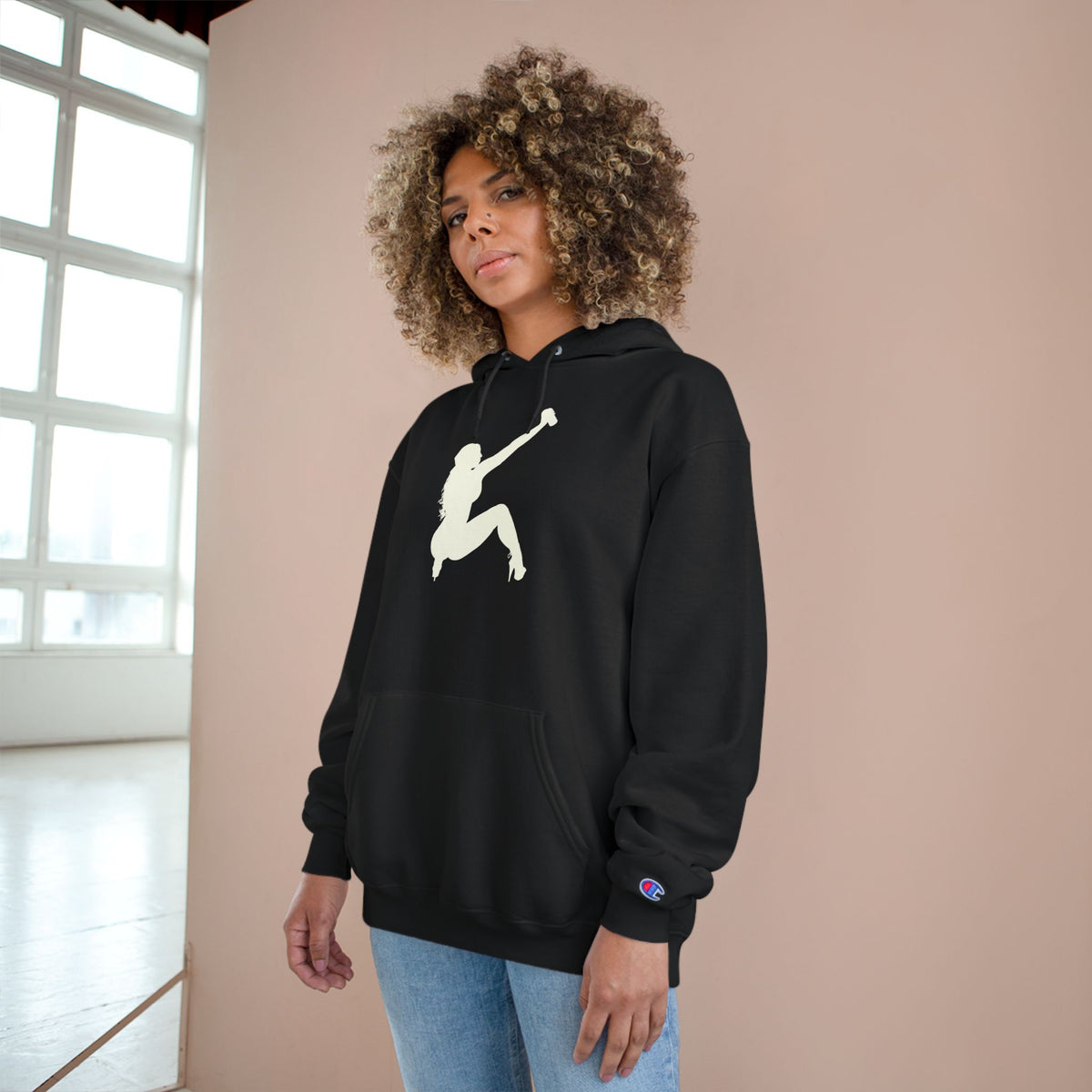 A black pullover hoodie shown 
