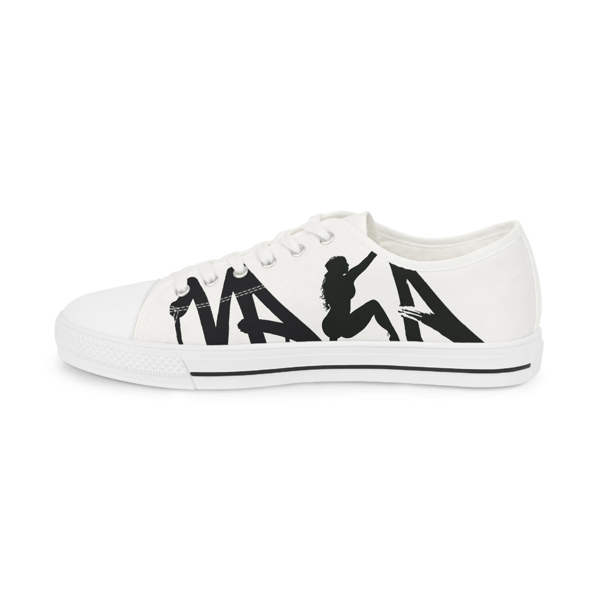 A white low-top canvas sneaker with a black graphic print on the side spelling 'VAKA' with silhouettes of a mother figure, photographed on a solid white background.