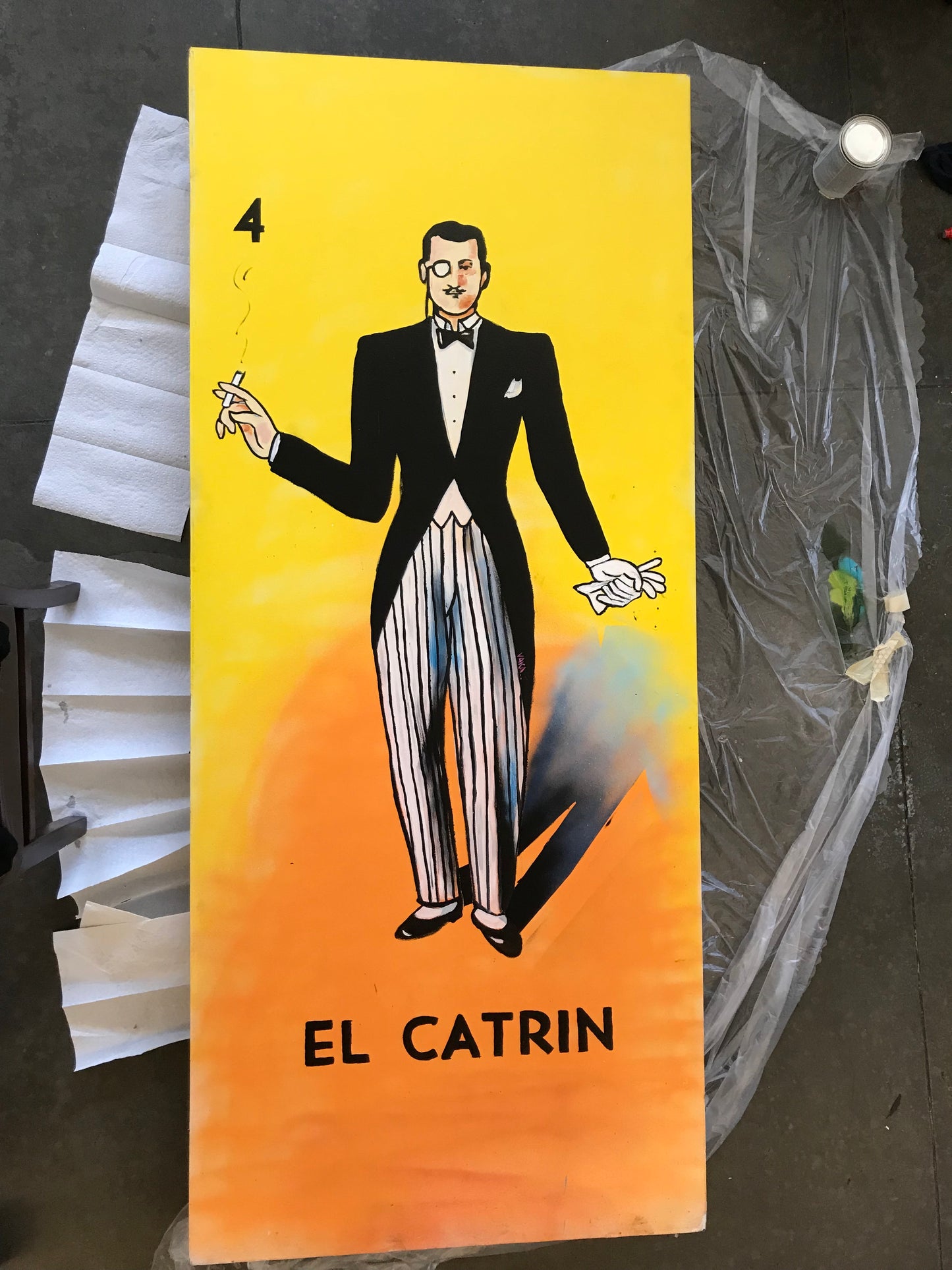 Card with an illustration of a person in a suit on a yellow and orange background, featuring the text 'El Catrin'.
